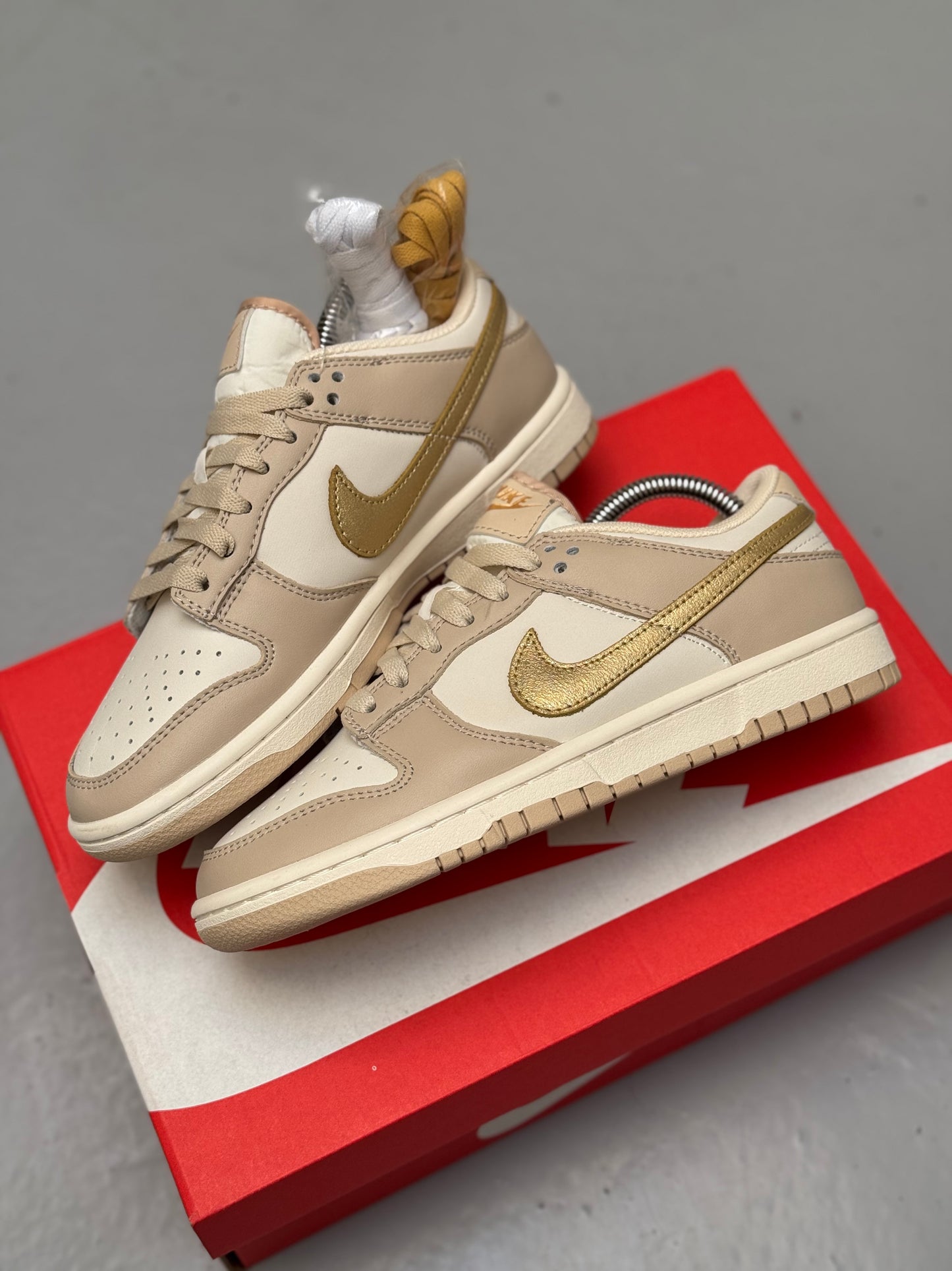 Nike Dunk Low Gold Swoosh
