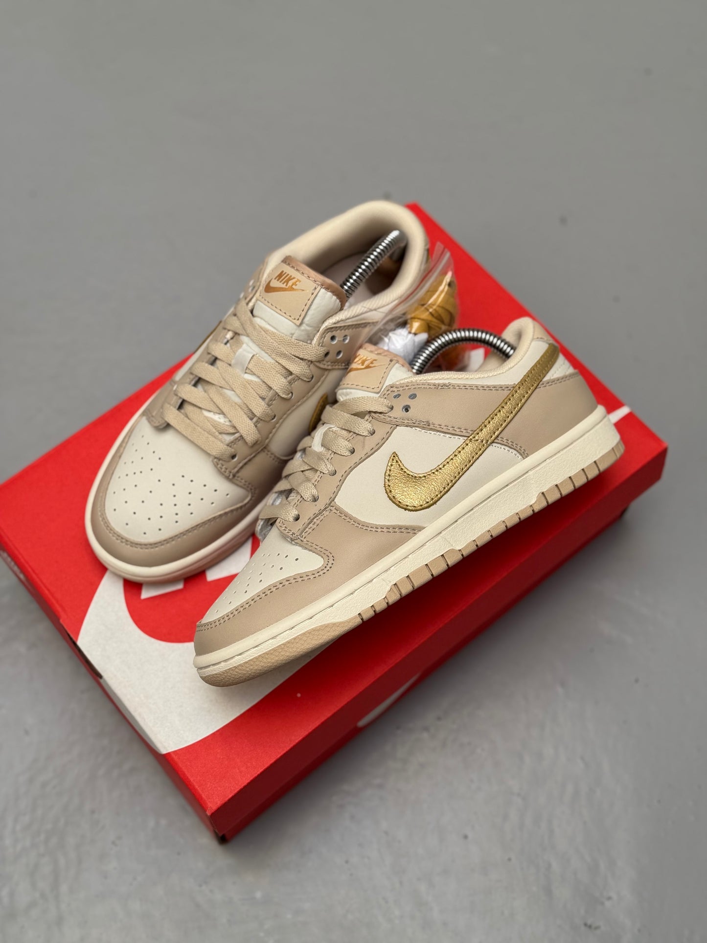 Nike Dunk Low Gold Swoosh