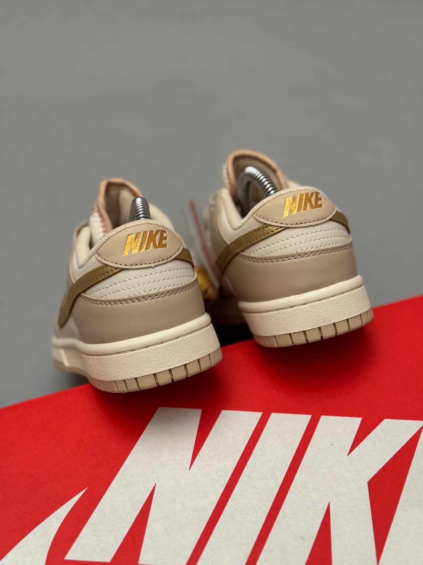 Nike Dunk Low Gold Swoosh