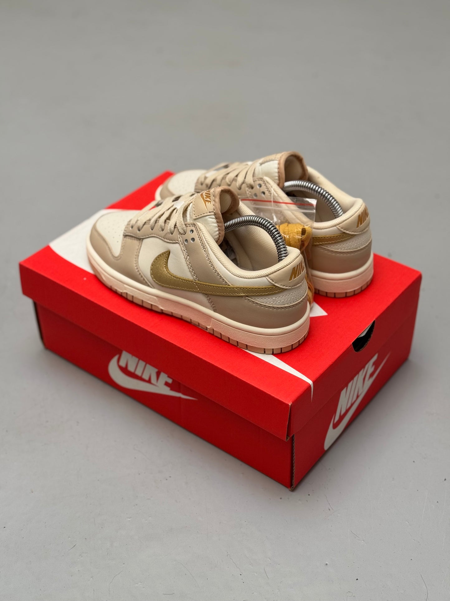 Nike Dunk Low Gold Swoosh
